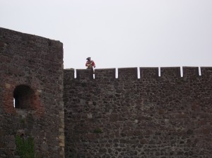 Carrickfergus castle. This red coat is keeping his weapon pointed at us, just in case we try anything.